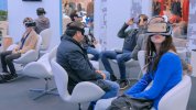 group-of-people-using-virtual-reality-headset-at-exhibition-event.jpg